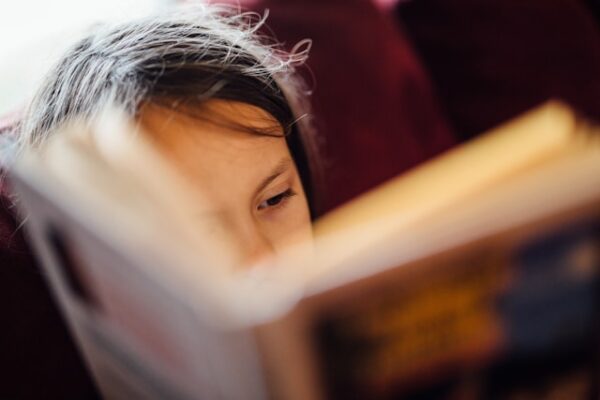 teen reading close up
