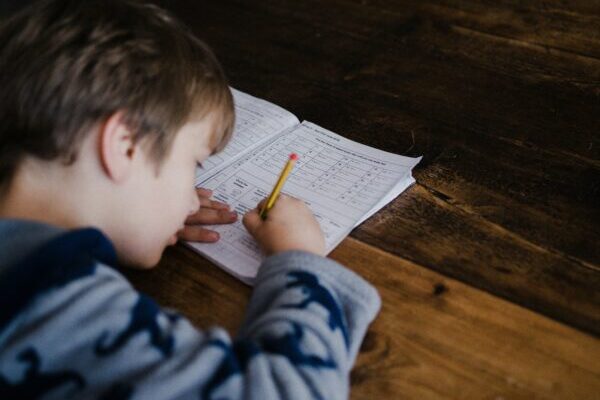 student studying math in a workbook