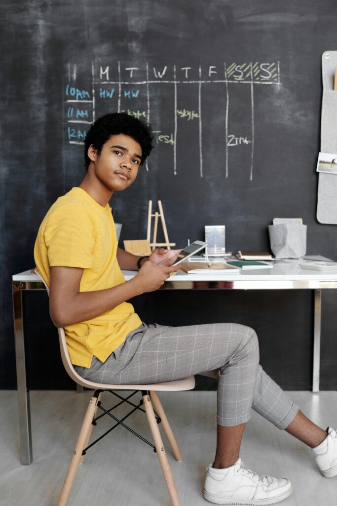 teen studying with planning calendar