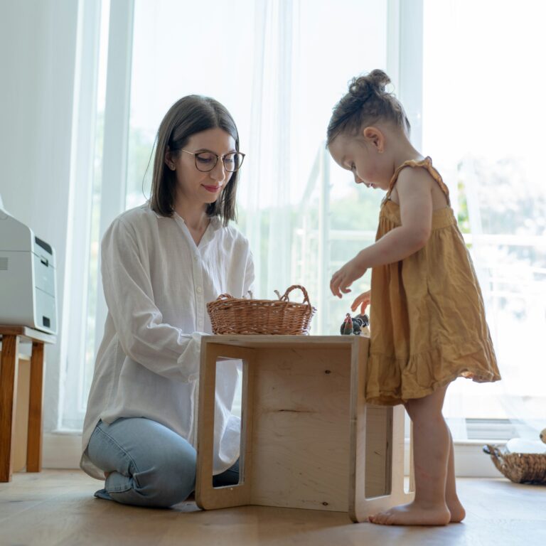 therapist with a child playing