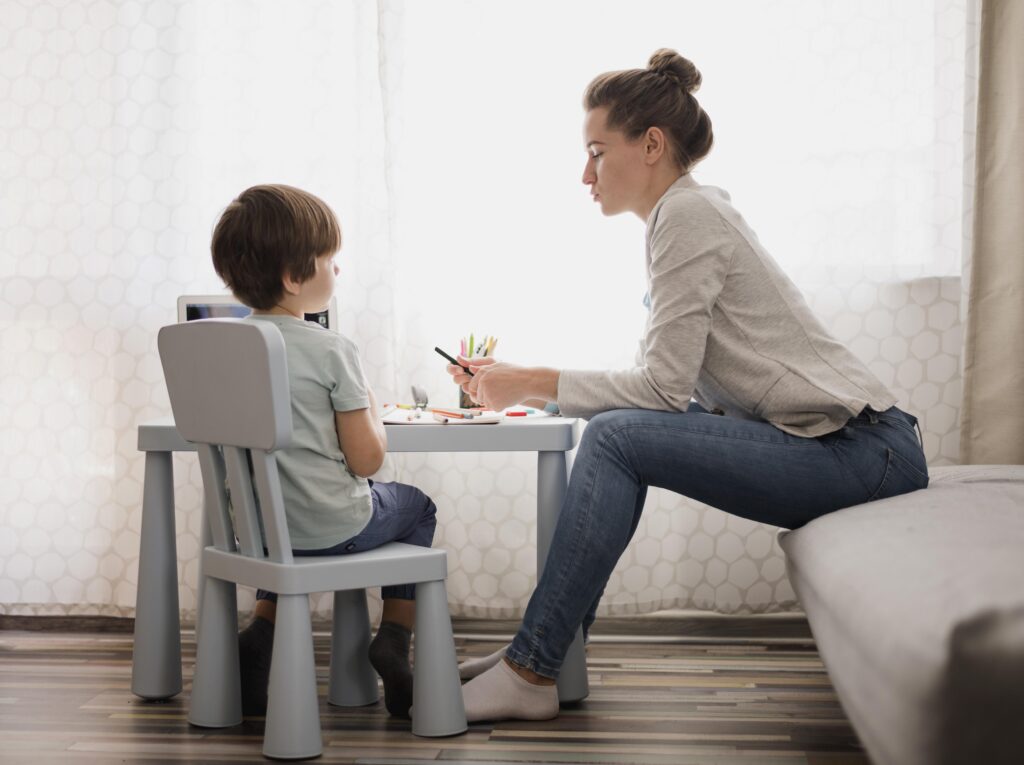 therapist with young pupil