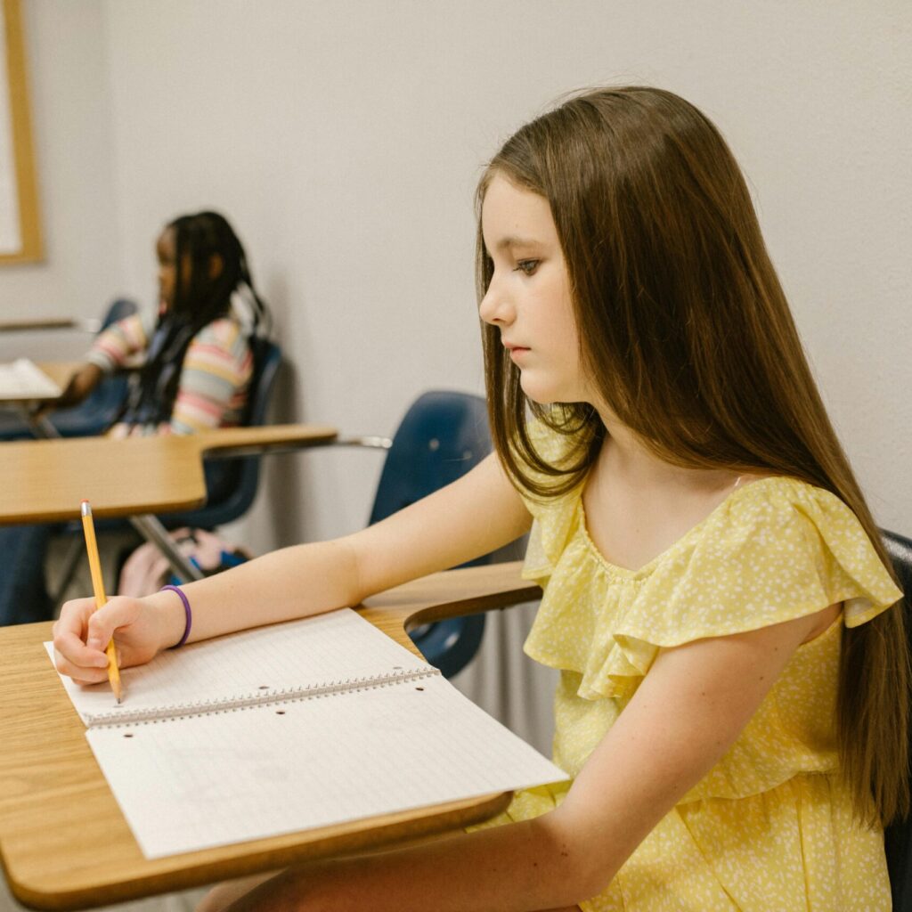 Teen girl studying at a desk